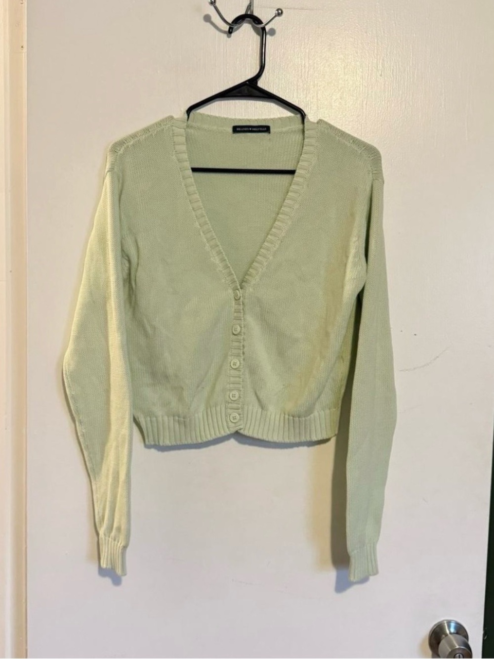 Brandy Melville pale green cropped cardigan sweater 
one size